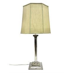 Silver plated Corinthian column table lamp, with moulded scroll and foliate details, upon on a stepped square base, with an octagonal cream fabric lamp shade with pale green piping, including shade H78cm