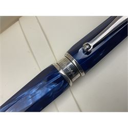 Montegrappa Emblema fountain pen, the blue pearl marbled barrel of octagonal form with silver mounts stamped 925 and silver mounted cap with 1912 emblem and clip with roller, in box, L13.5cm