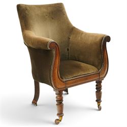 William IV mahogany framed lyre shaped library armchair, high back over scrolled arms and sprung seat, upholstered in chocolate brown velour fabric, the lyre-shaped frame raised on turned front and splayed rear supports with ceramic castors