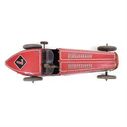 Mettoy tinplate clockwork racing car, the boat tailed red body with lithographed details, racing no. 7, with Dunlop Fort tyres, driver and key, H8cm, L32cm