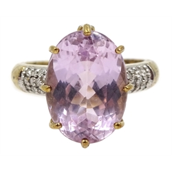 9ct gold oval kunzite ring with diamond set shoulders and gallery,  hallmarked