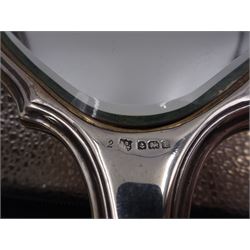 Art Deco five piece green guilloche enamel silver dressing table set, comprising hand mirror, two hair brushes and two clothes brushes hallmarked Barker Brothers Silver Ltd, Birmingham 1930, together with another silver brush, hallmarked Davis, Moss & Co, Birmingham 1928 (6)