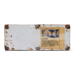 18th century English Delft flower brick, painted with a Chinese figure stood beside antiques, W16.5cm