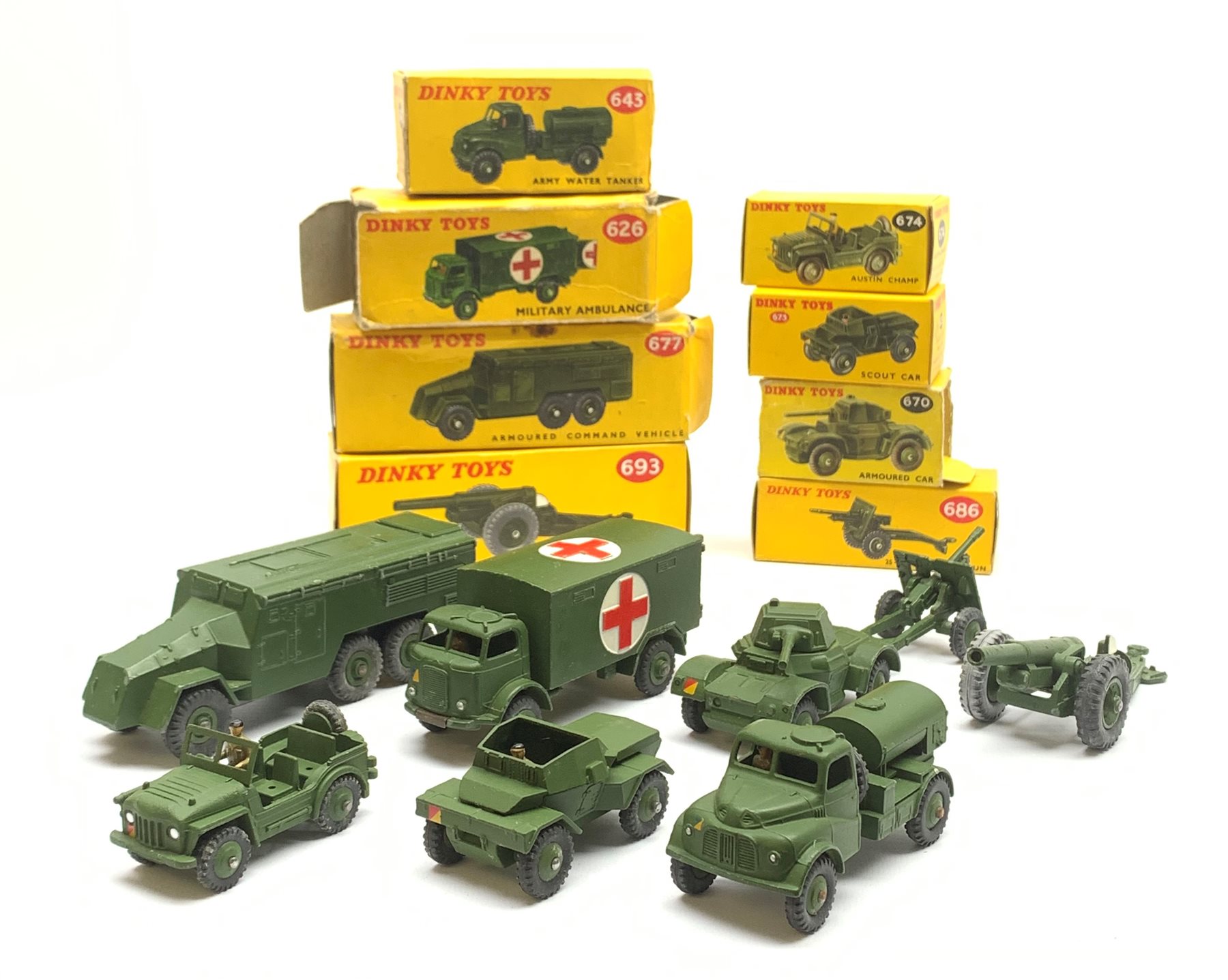 Dinky - eight military vehicles comprising 7.2 Howitzer No.693, Armoured Command Vehicle No.677, Military Ambulance No.626, Armoured Car No.670, 25-Pounder Field Gun No.686, Austin Champ No.674, Army Water Tanker No.643 and Scout Car No.673, all boxed (8)
