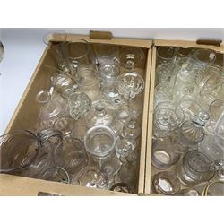 A large group of Victorian and later clear glassware, to include various cut glass, drinking glasses of various form, jugs, vases, bowls, etc. 