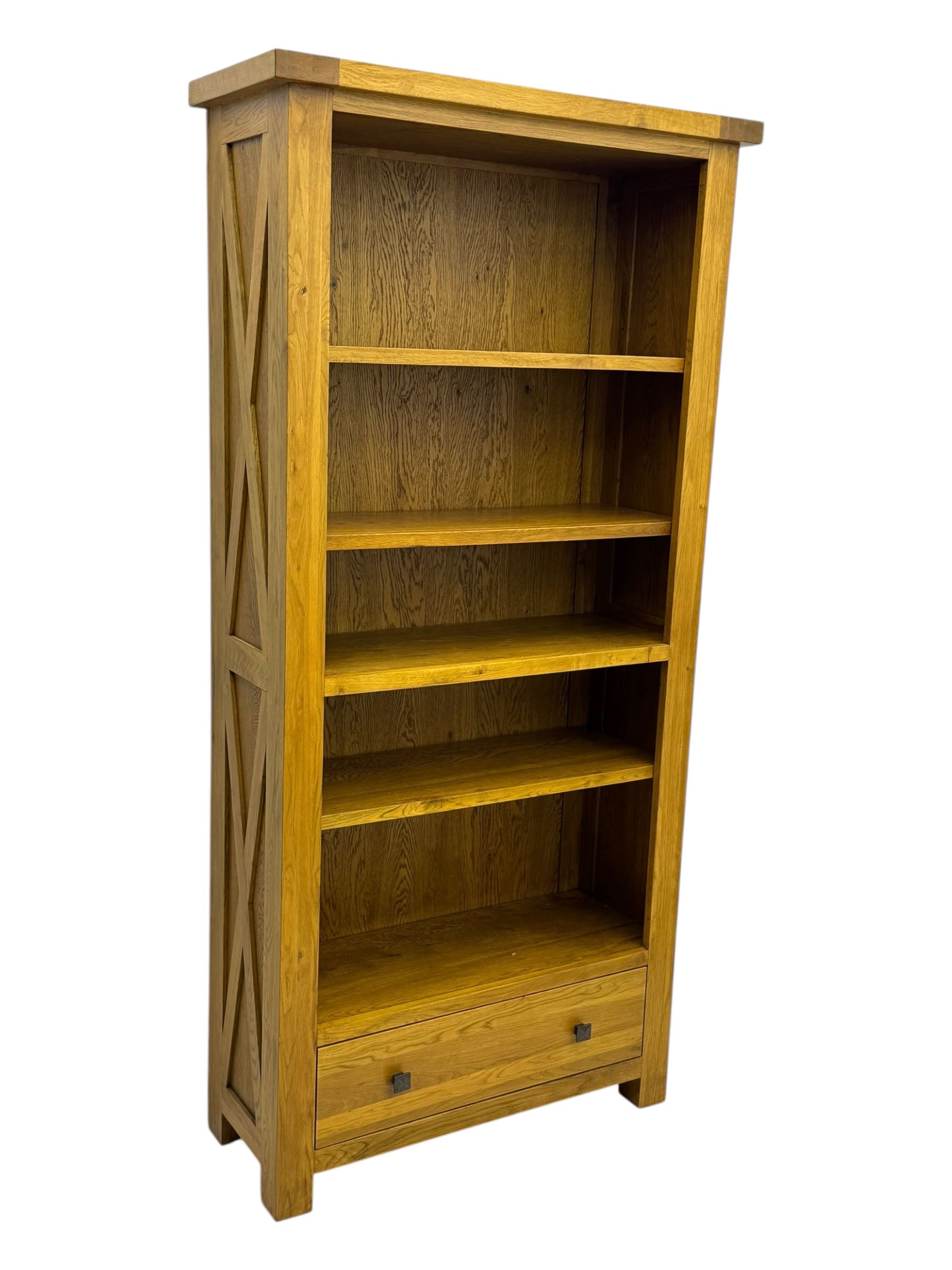 Oak Furnitureland, golden oak open bookcase fitted with single drawer
