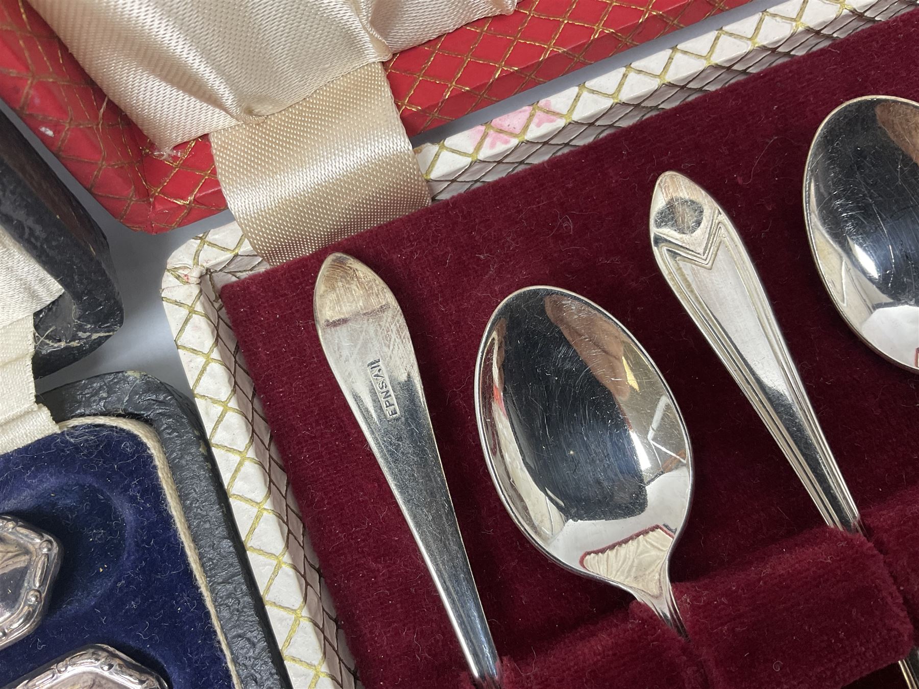 Group of silver to include cased set of six silver handled knives hallmarked Birmingham 1921 by Raeno Silver Plate Co, three hallmarked napkin rings etc together with silver plated and other metalware etc