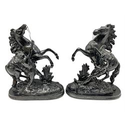 Pair of spelter figural statues of man and rearing horse, height 44cm and 42cm