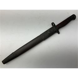 Australian Owen sub-machine gun bayonet, the 25.5cm fullered steel blade marked '53'; in metal bound wooden scabbard marled MA53 L41cm overall