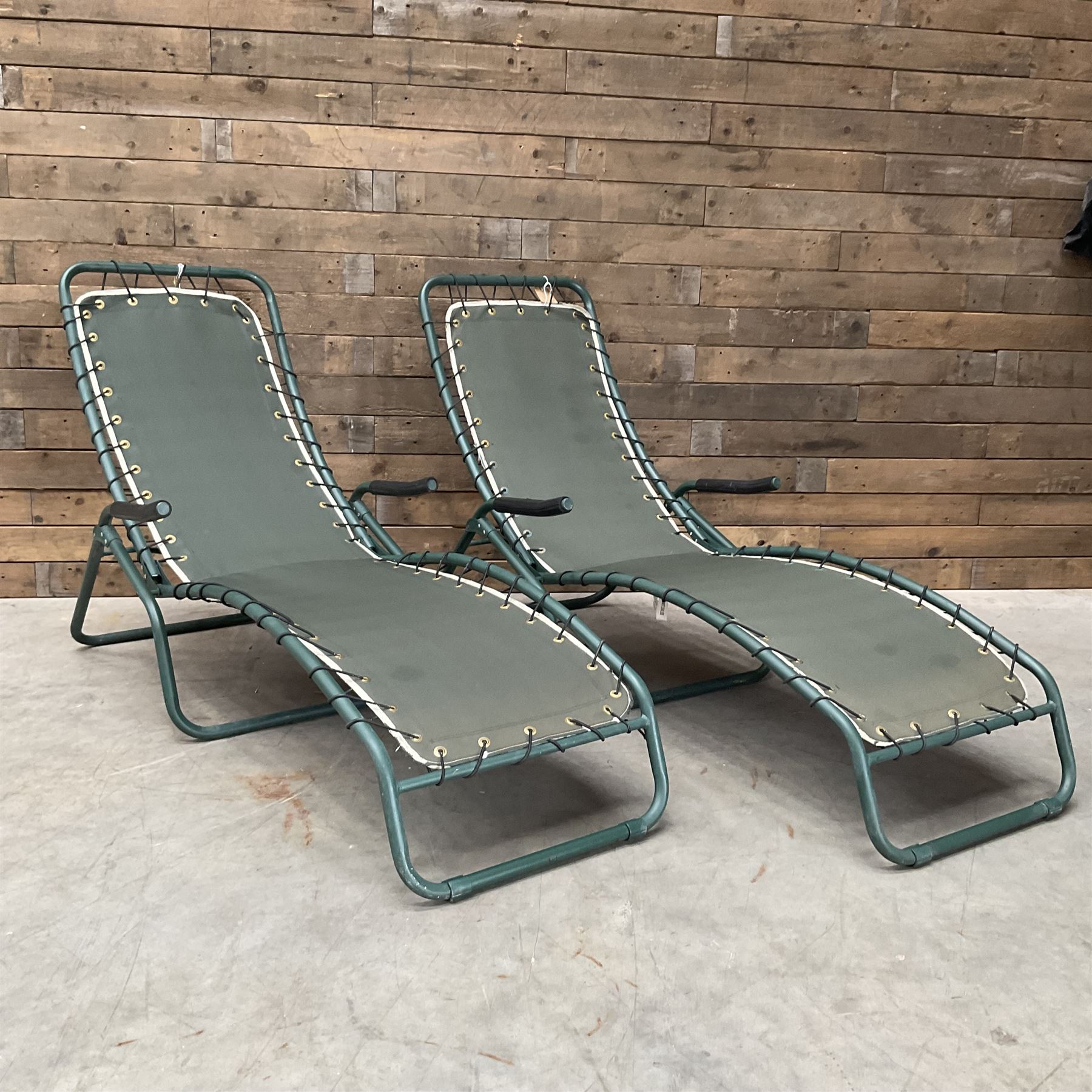 Pair metal framed folding sun loungers