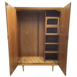 Wrighton - mid-20th century teak wardrobe, two doors enclosing hanging rail, shelves and hinged compartments, on turned tapering feet
