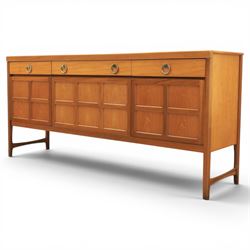 Nathan - 'Squares' mid 20th century teak sideboard, fitted with three drawers with brass ring handles, above a central fall front cabinet, flanked by two cupboard doors, raised on square tapering supports