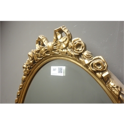  Ornate oval gilt framed bevel edge mirror, (W44cm, H76cm) and similar mirror  