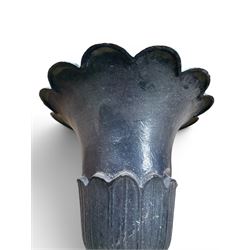 Pair of Victorian large scale cast iron garden urns, flared petal shaped rim with tapering waist, gadrooned base on square plinth, finished in black paint