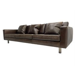 Ralph Lauren - three seat sofa, upholstered in buttoned brown leather with additional cushions, on turned brushed metal feet