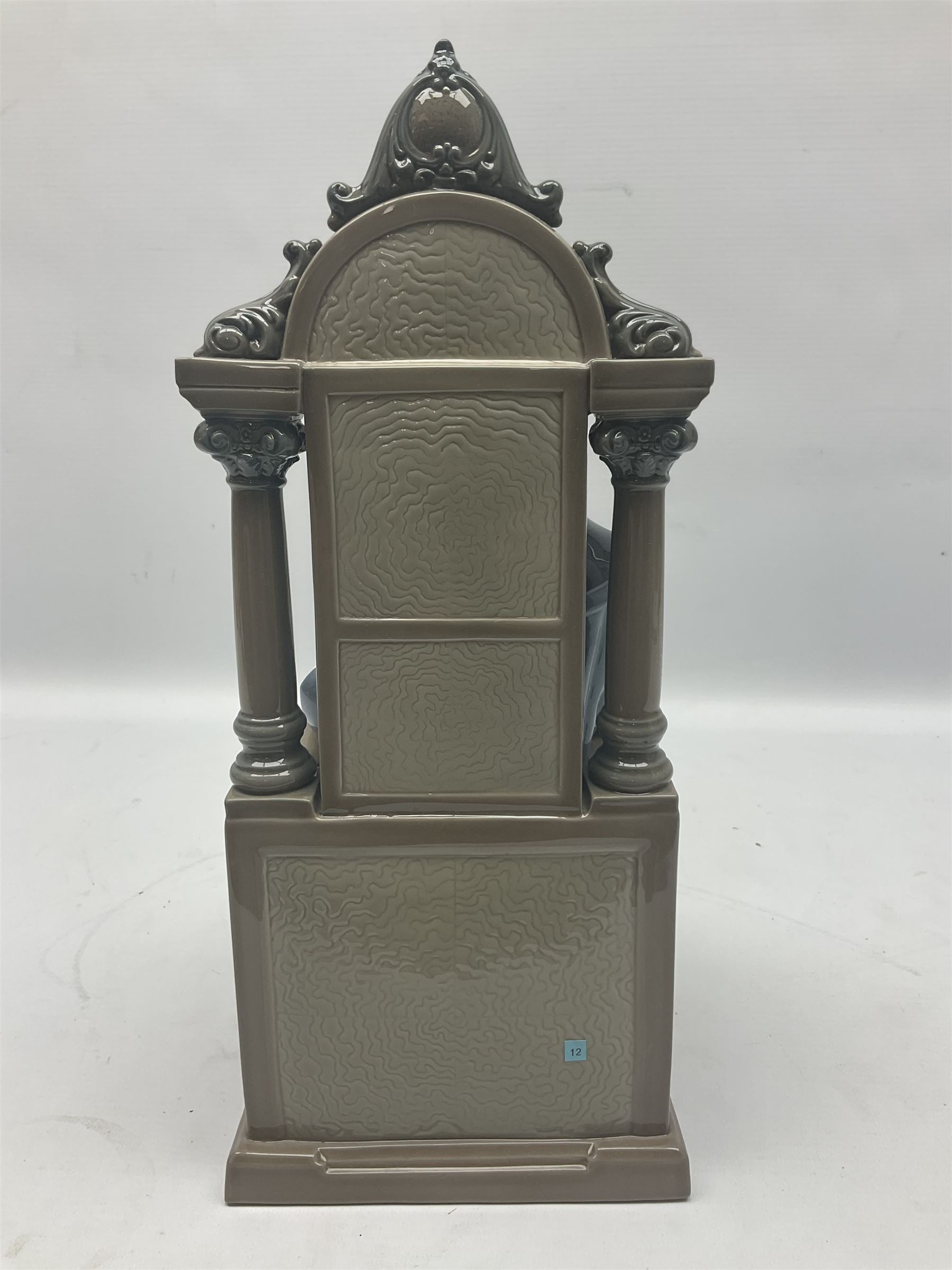 Lladro figure, Justice, modelled as a judge sat in a char, sculpted by Salvador Furió, with original box, no 5489, year issued 1988, year retired 1993, H34cm 