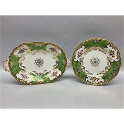 Coalport green batwing pattern tea wares, decorated with finely enamelled floral sprays within gilt reserves, comprising teacup trio, twin handled cake plate and side plate, pattern no Y2665, together with a Coalport for Harrods cup and saucer similarly decorated, the saucer with stamped mark beneath 'Manufactured for Harrods Ltd, Brompton Rd London', all with green Coalport AD 1750 marks beneath, largest W31cm (7)