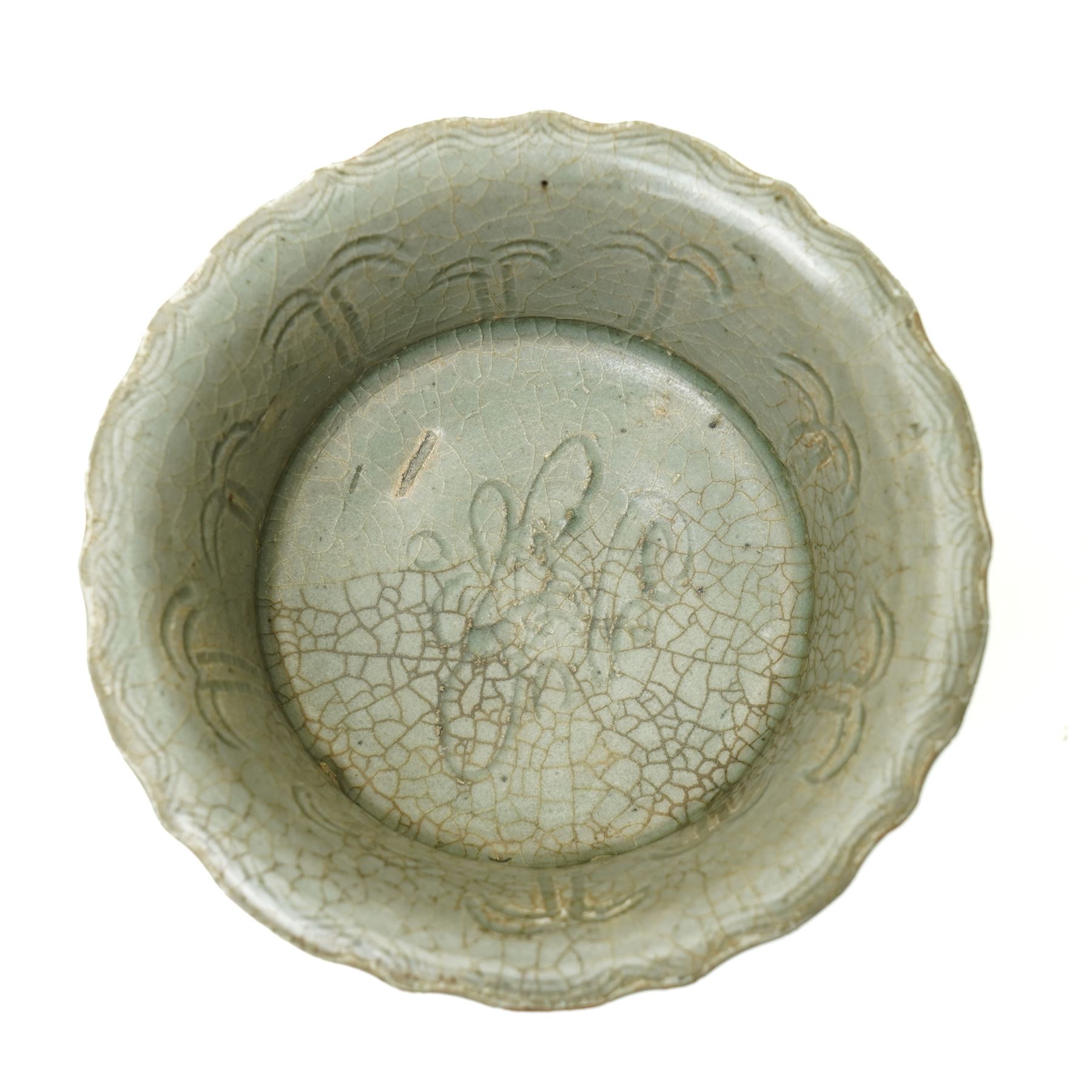 Chinese Ming dynasty Longquan celadon stem cup, of flared form rising from a splayed foot, incised decoration to stem and bowl, with fluted rim, unmarked, H10cm