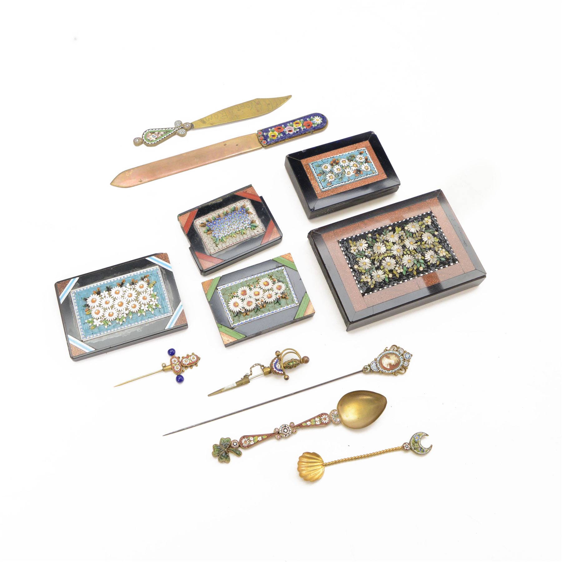 Five micro mosaic paperweights, all decorated with flowers and goldstone, together with other items with micro mosaics 