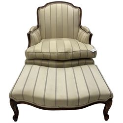 French Louis XV design armchair, shaped back over serpentine fronted seat, raised on cabriole supports (W85cm H90cm); and matching serpentine footstool, both upholstered in cream striped fabric (W82cm D55cm H30cm)