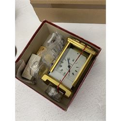 Quantity of clocks, clock parts and clock related items: early to mid 20th century clock cases and mantel clocks, 20th century wall hanging clocks, quantity of clock movements etc.