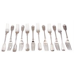 Twelve Victorian and later silver Fiddle pattern dessert forks, all engraved with monogram to terminal, seven hallmarked Chawner & Co, London 1855, the other five hallmarked James Dixon & Sons Ltd, Sheffield 1908, 1912 & 1915