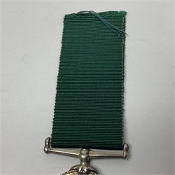 Victoria Long Service in the Volunteer Force Medal awarded to 369 Bombr. W. Woodward 1st Lincs. V.A.; and reproduction Victoria India Medal with Lucknow clasp; both with ribbons (2)