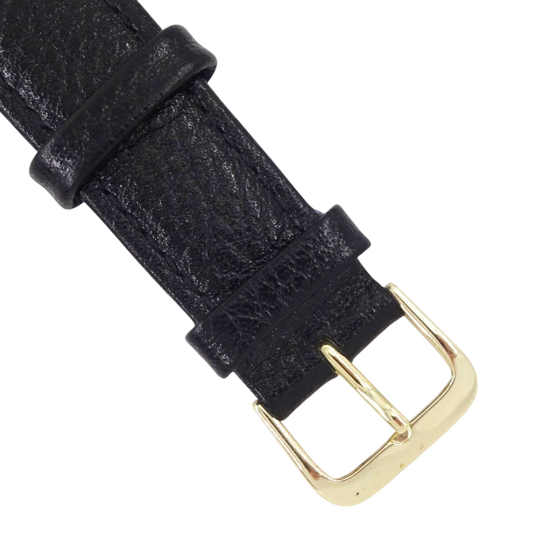 Cauny Prima gentleman's gold-plated and stainless steel manual wind wristwatch, black dial with dagger and Arabic hour markers and subsidiary seconds dial, on black leather strap