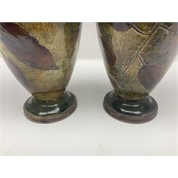 Pair of Royal Doulton Stoneware Vases with leaf decoration, by Ethel Beard, impressed marks to base numbered 6768 and 8222 and initials EB, H32cm