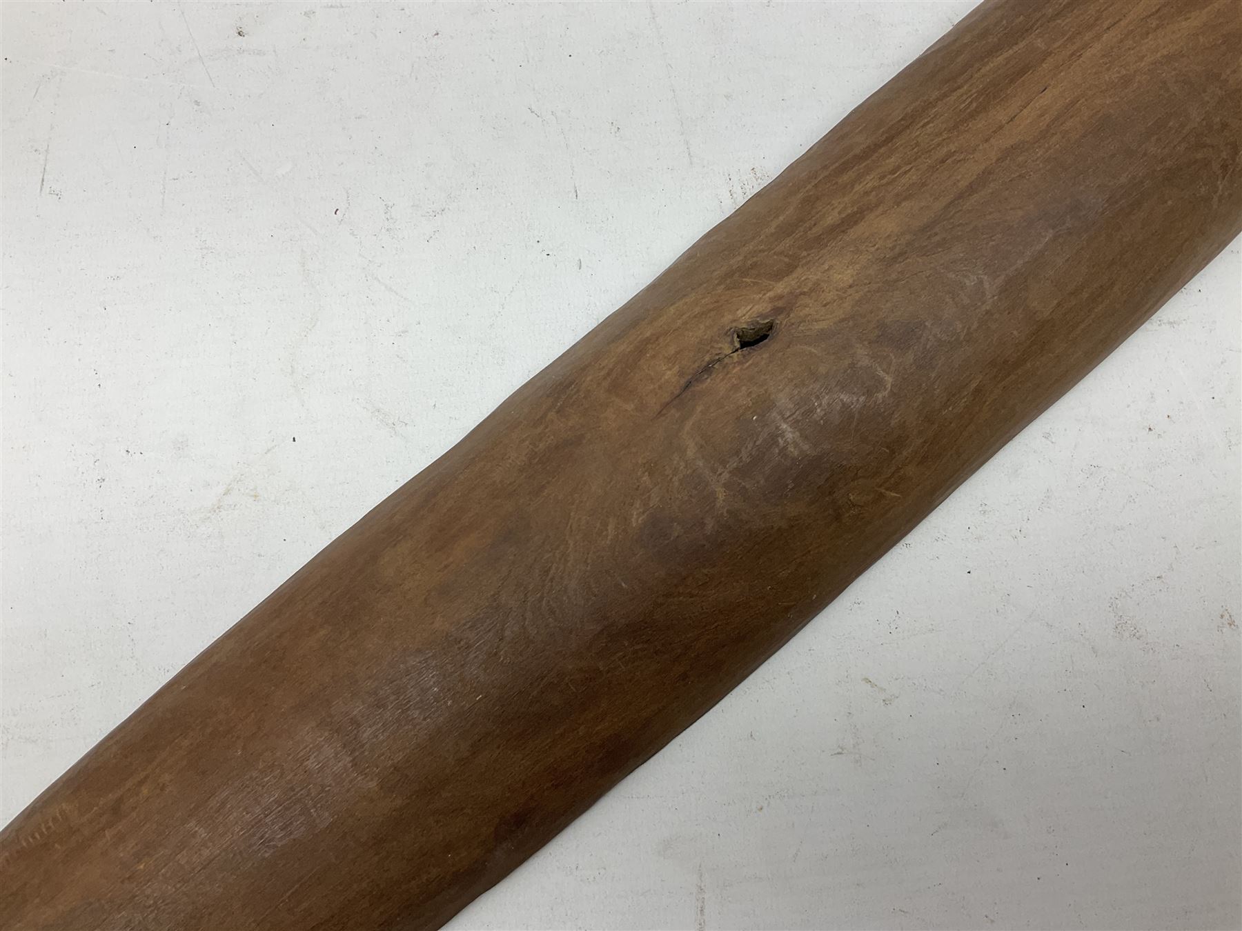 Australian Aboriginal shield, carved with Kangaroo and Emu, 74.5cm; Spear painted with aquatic creatures 78cm, and Spear thrower 81cm (3)