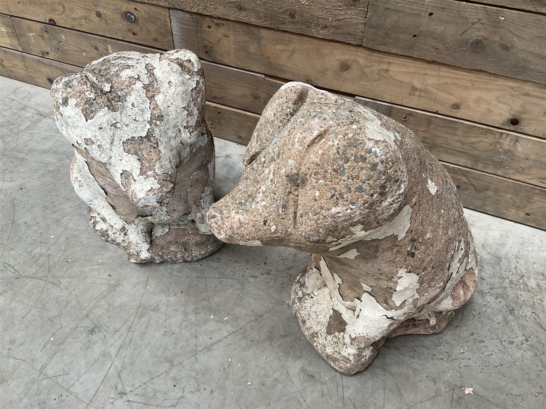 Pair painted stone pigs 