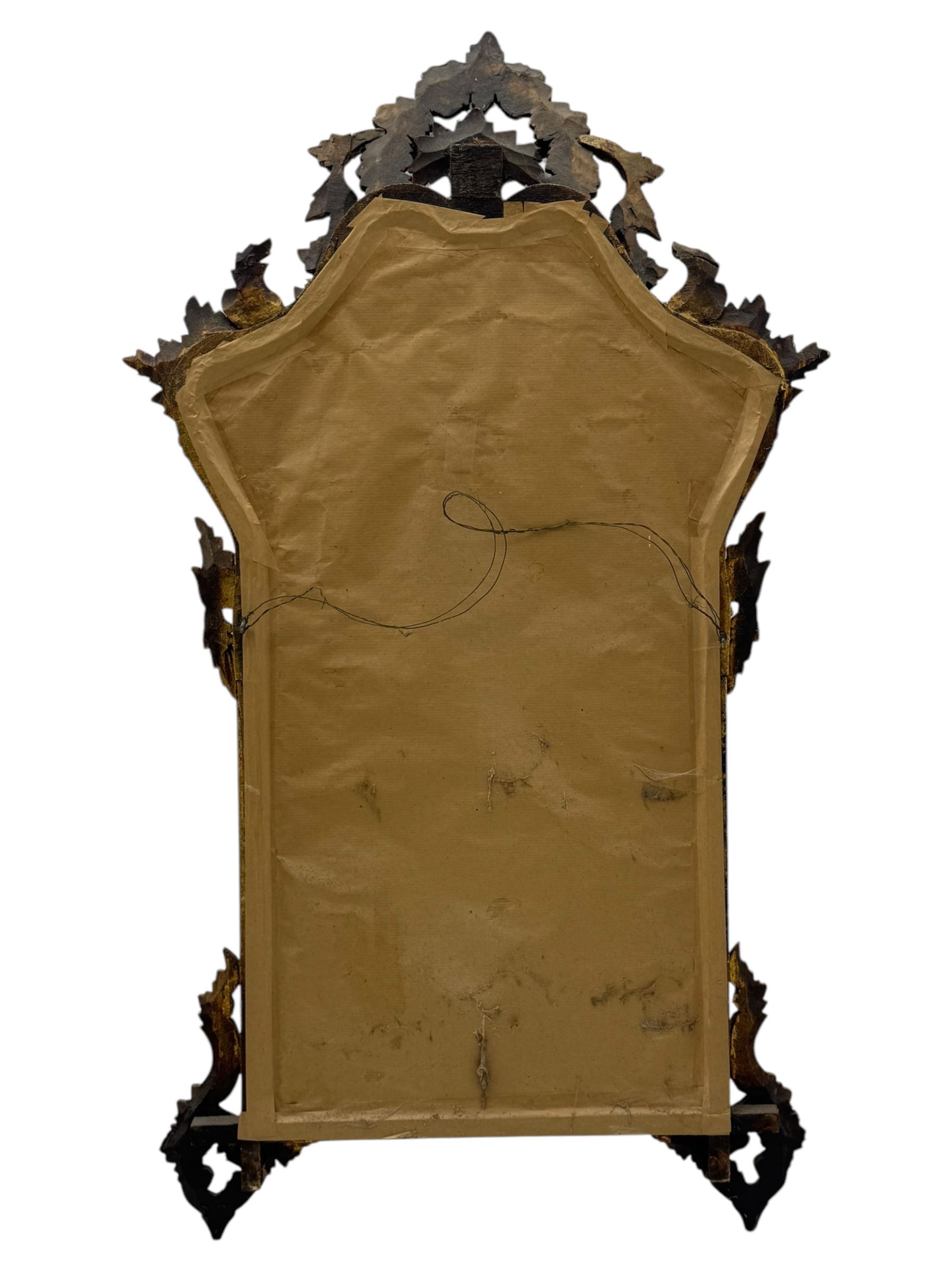 18th century design gilt framed wall mirror, within a pierced and scrolling foliate frame, leaf sprays and flowerhead cresting