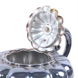 Early 20th century silver plated four piece melon-shaped tea service by James Dixon & Son Sheffield, comprising teapot, hot water jug, milk jug and open sucrier, together with a silver plated twin handled tray with engraved floral decoration