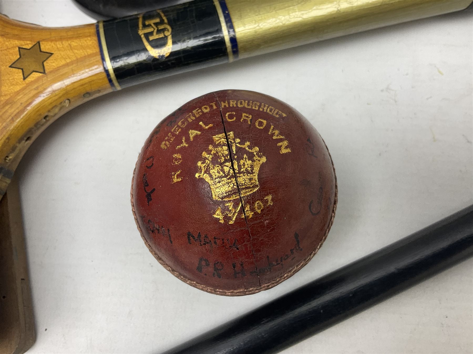 Walking cane, tennis racket, cricket ball (signed) and knight novelty cigarette lighter 