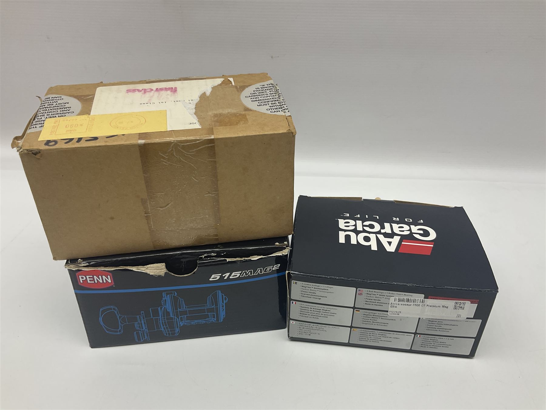 Three multiplier spool sea fishing reels, to include Swedish Abu Ambassaduer 700c Black, with spare spool, Swedish Abu Garcia Ambassadeur 6500 C3 CT MAG and Penn 515 MAG2, all boxed