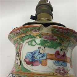 19th century Chinese Canton famille rose vase, converted to a table lamp, of shouldered cylindrical form, with twin gilt lion mask ring handles, the body decorated with four alternating panels of figural scenes and birds and insects, H31cm excluding fitting