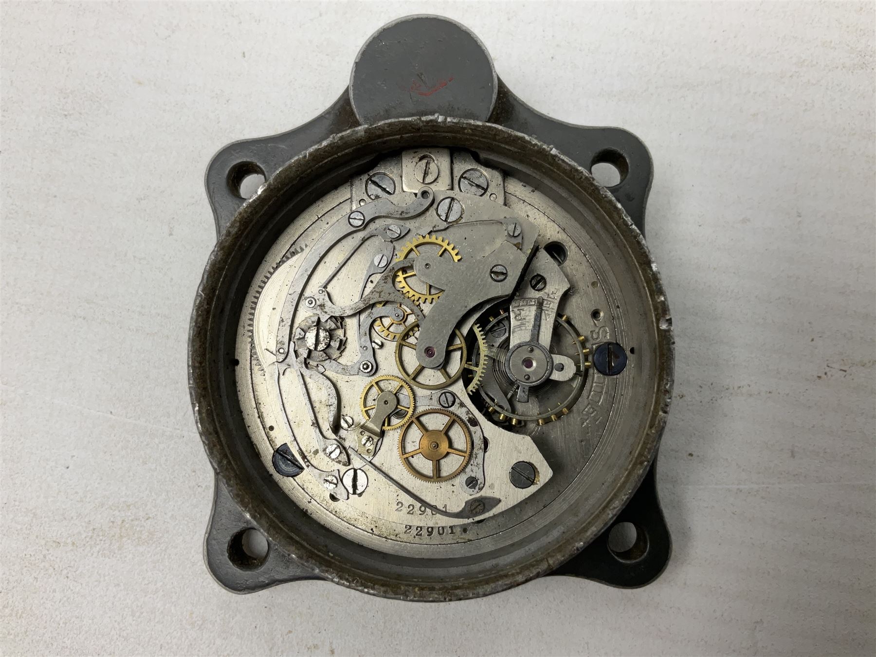 WW2 Jungans Luftwaffe aircraft cockpit clock with luminous centre sweep seconds hand, baton hour and minute hands, regulation 45mm black dial with date recorder, formerly illuminous Arabic numbers and minute track, rotating bezel (seized), going barrel movement with a lever escapement serial No 22901 jewelled to the centre wheel, over-sprung balance with timing  screws, max.H8cm