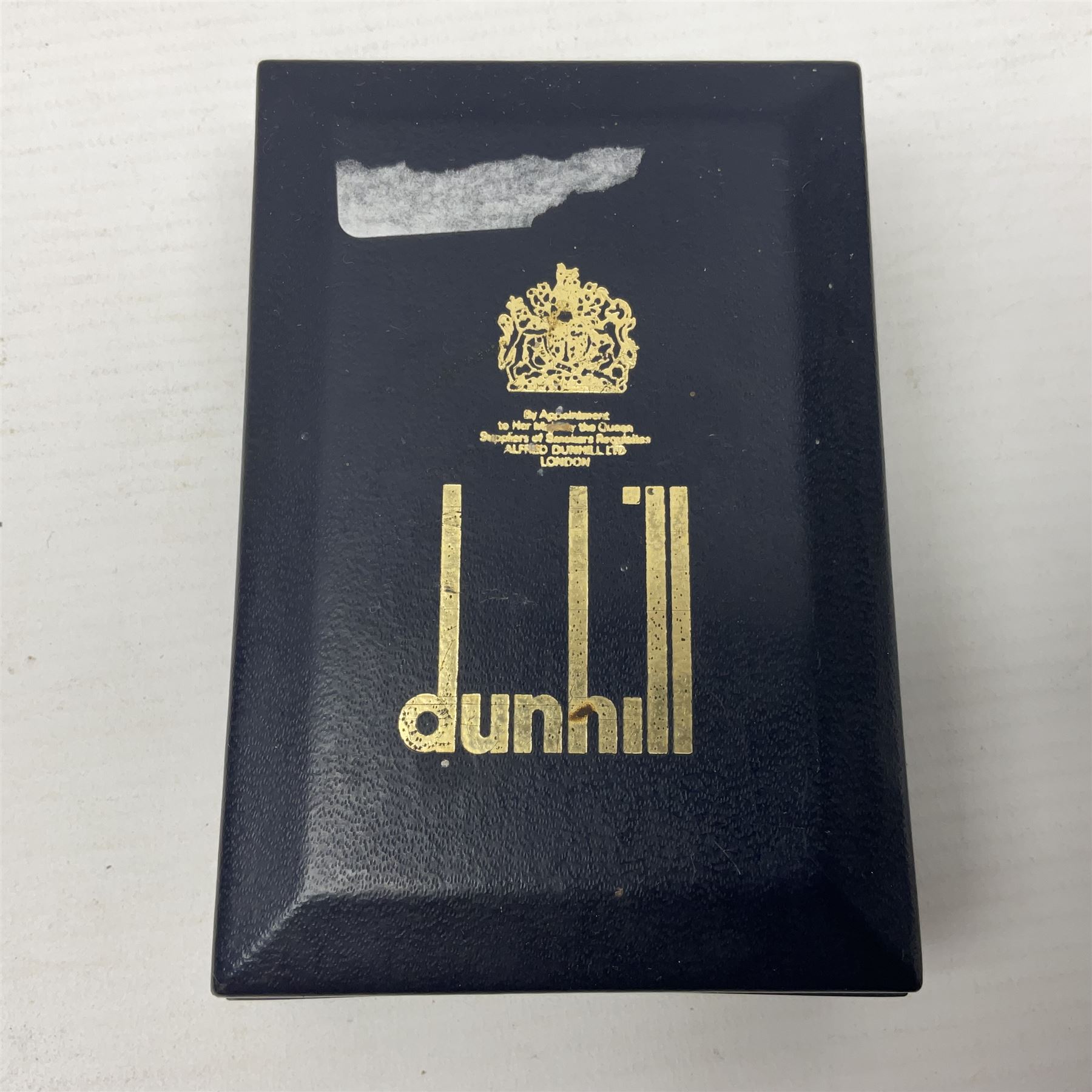 Dunhill gold plated lighter with textured bark effect decoration, in fitted case