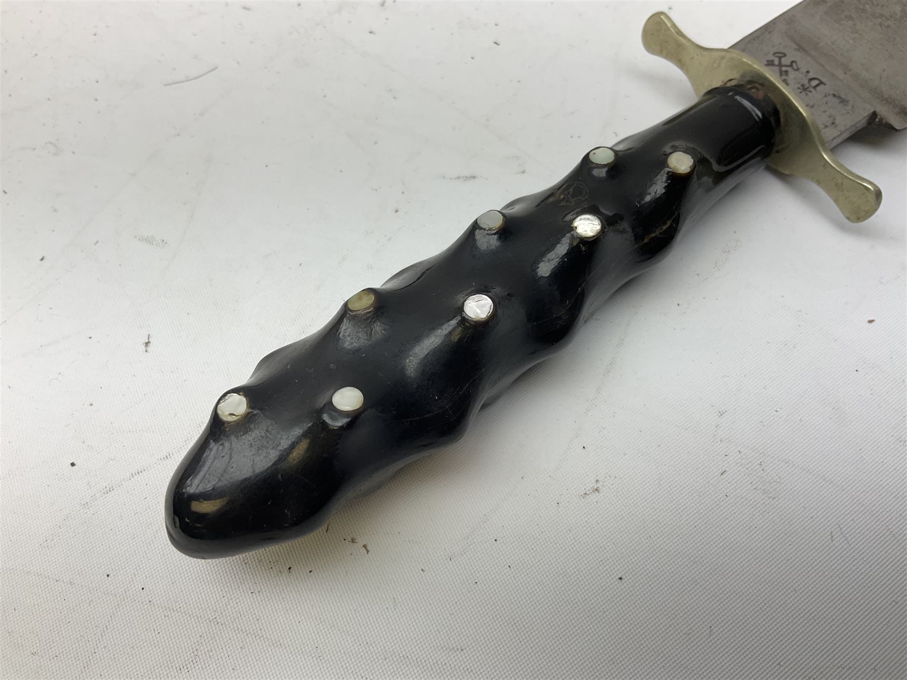 Hunting knife by J Nowill & Sons, Sheffield, the handle inset with mother of pearl, blade length 19cm; George Wolstenholme IXL lock-knife with antler scales L29cm open; and another Bowie style hunting knife marked 'V.R. Warranted Sheffield Joseph Ellis & Sons' in leather sheath (3)