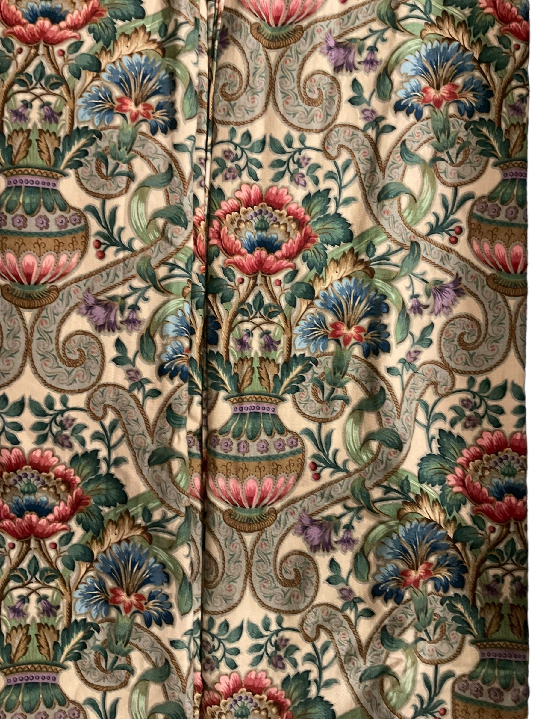 Two pairs of lined curtains, ivory ground fabric decorated with jardinieres of flowers spaced by scroll motifs, W329cm, fall 237cm (2)