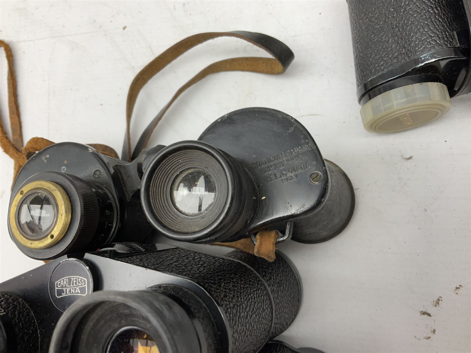Twelve pairs of binoculars to include BWCF 7x35 Extra Wide Angle, Carl Zeiss Jena Delturis 8x24, Carl Zeiss Jena Jenoptem 8x30W, Chinon Countryman 10x50,  Ajax 8x30, Regent 16x50, etc,  some with cases