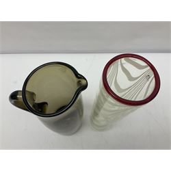 Two Whitefriars glass jugs, together with a Swedish Pukeberg art glass vase and three art glass bowls, including large pink example, some signed to base, tallest H30.5cm