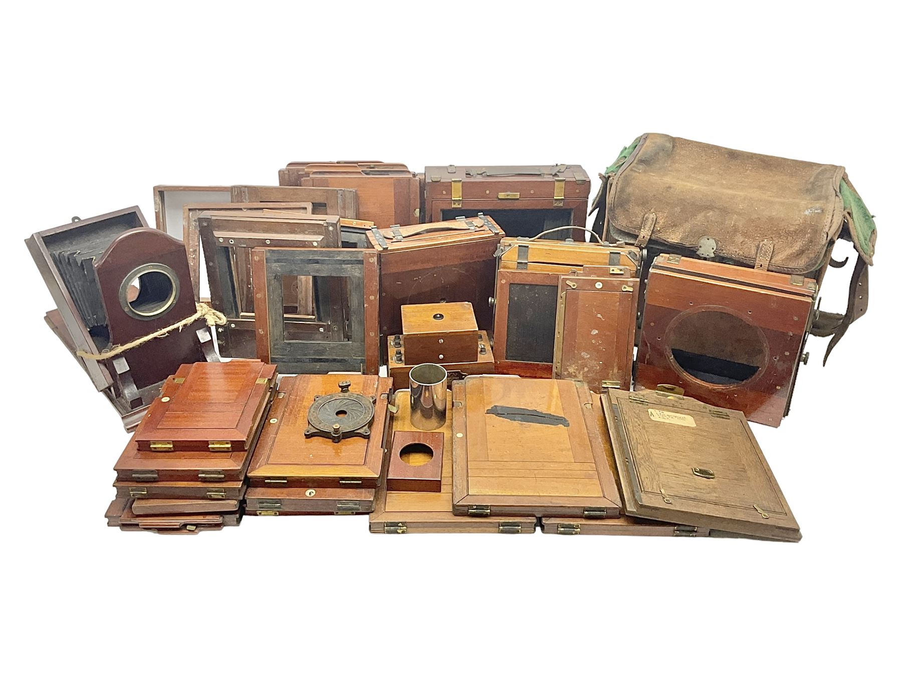 Collation of folding plate cameras of various sizes folding plate in mahogany and lacquered brass, together with camera plates and slides
By vendors repute some slide are from the Gandolfi workshop