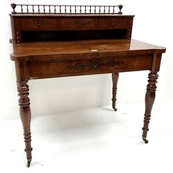 19th century inlaid grained oak writing desk, raised correspondence compartment with gallery back, three short and one long drawer, turned supports on castors 