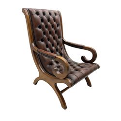 Georgian design mahogany x-framed open armchair, upholstered in studded leather