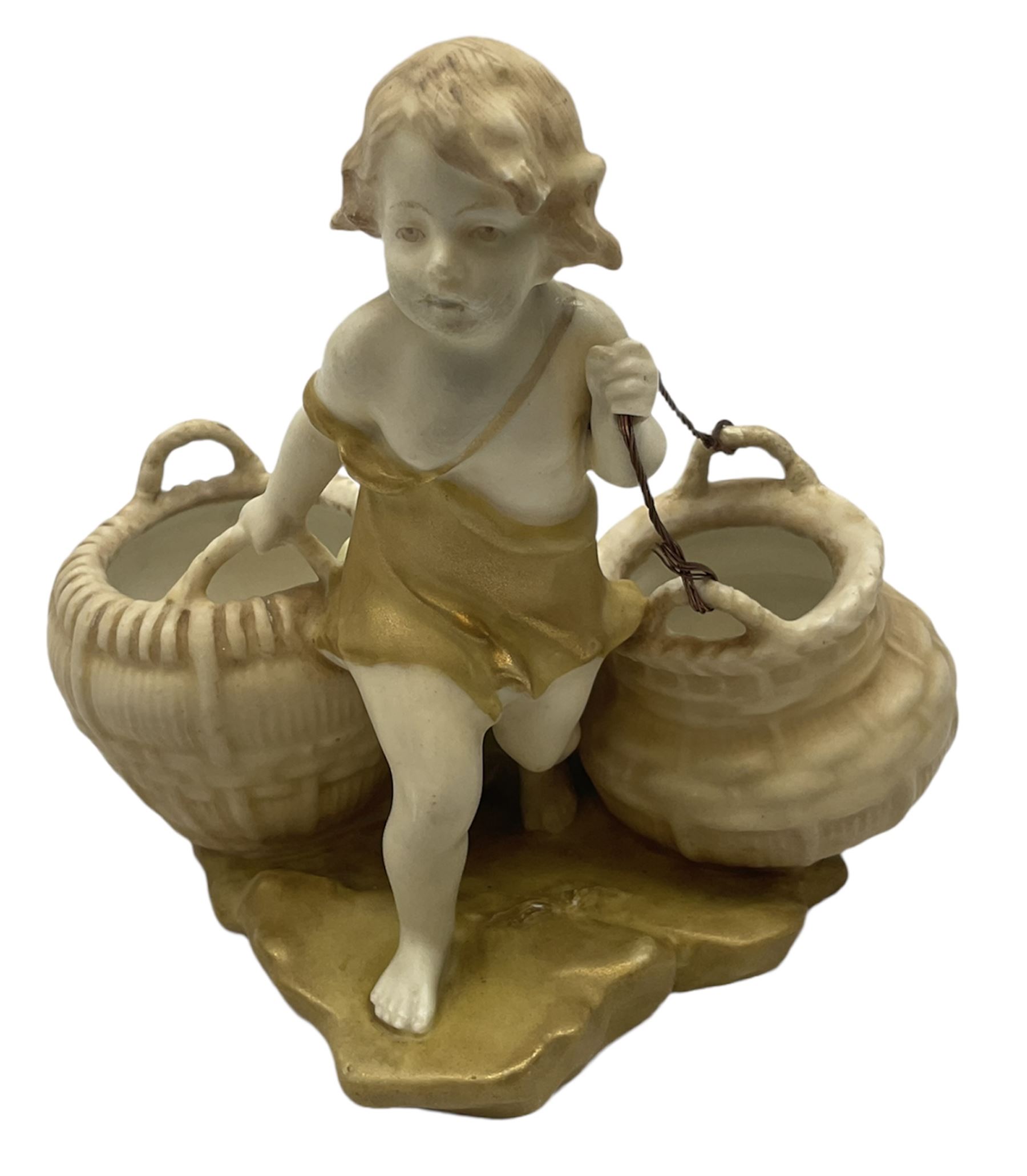 Royal Vienna Ernst Wahliss Art Nouveau figure, of a child pulling two baskets, H15cm