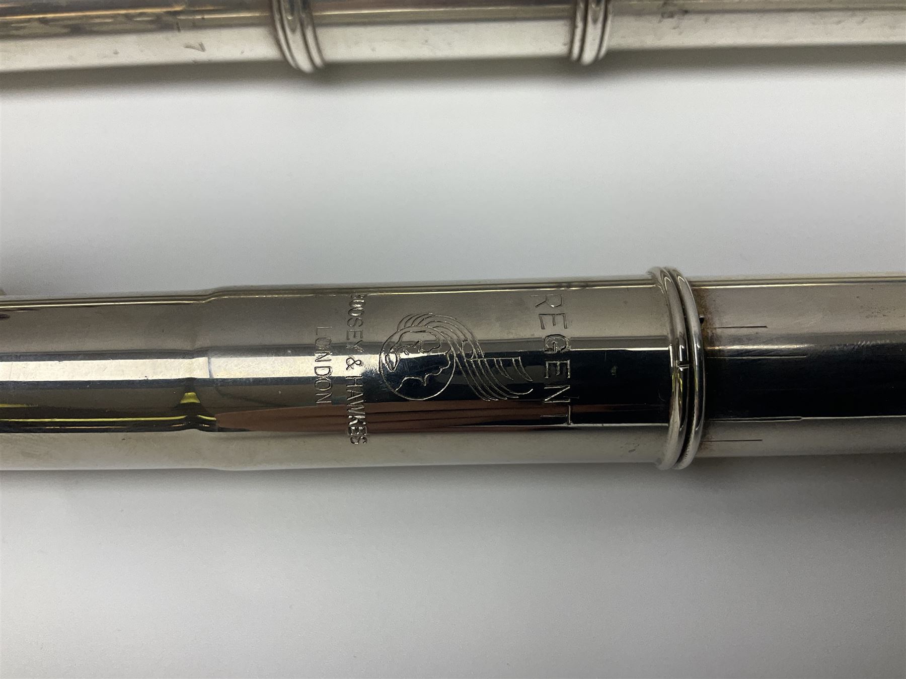 Boosey & Hawkes London Regent three-piece flute, serial no.345447; in B&H Bandhite hard carrying case; and Deg Music Company Inc. USA Claudel Model three-piece flute, serial no.491718, in hard carrying case (2)