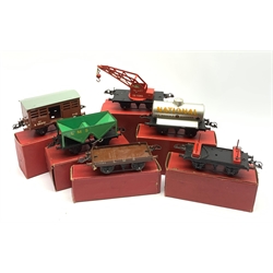 Hornby '0' gauge - six goods wagons comprising Hopper Wagon, Flat truck, No.1 Petrol Tank Wagon 'National Benzole', No.1 Lumber Wagon, No.1 Cattle Truck and No.1 Crane Truck, all boxed
