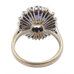 18ct white gold oval sapphire and round brilliant cut diamond cluster ring, Sheffield 2000, sapphire approx 3.75 carat, total diamond weight approx 0.70 carat