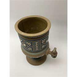 A late 19th century Doulton Lambeth stoneware water filter with original spigot, decorated with relief moulded foliate bands, with impressed marks and monogrammed for Laura Gooderham beneath, H34cm. 